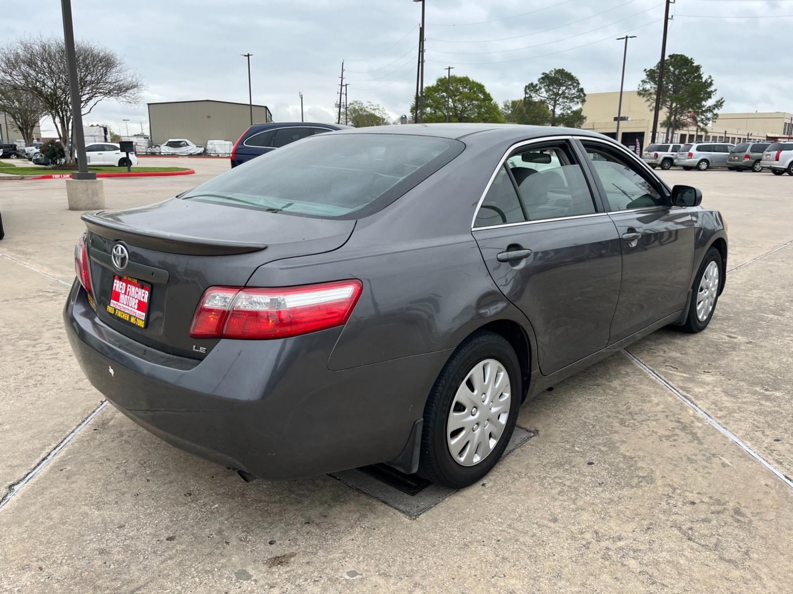 2007 GRAY /gray Toyota Camry CE 5-Spd AT (4T1BE46K37U) with an 2.4L L4 DOHC 16V engine, 5-Speed Automatic Overdrive transmission, located at 14700 Tomball Parkway 249, Houston, TX, 77086, (281) 444-2200, 29.928619, -95.504074 - Photo #6